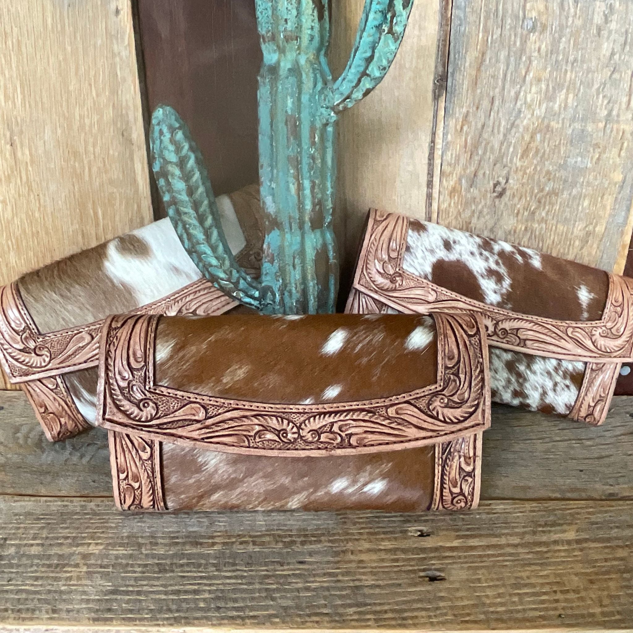 Tooled cowhide western wallet multiple wallets together